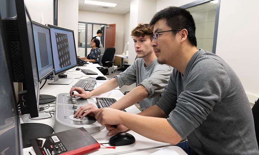 Daniel Wrapp and Nianshuang Wang Collect Cryo-EM Data